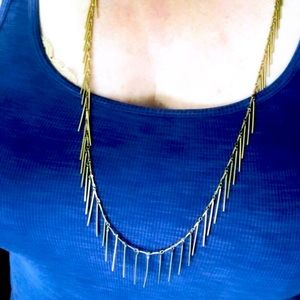 Goldtone boho style drop sway link metal necklace.